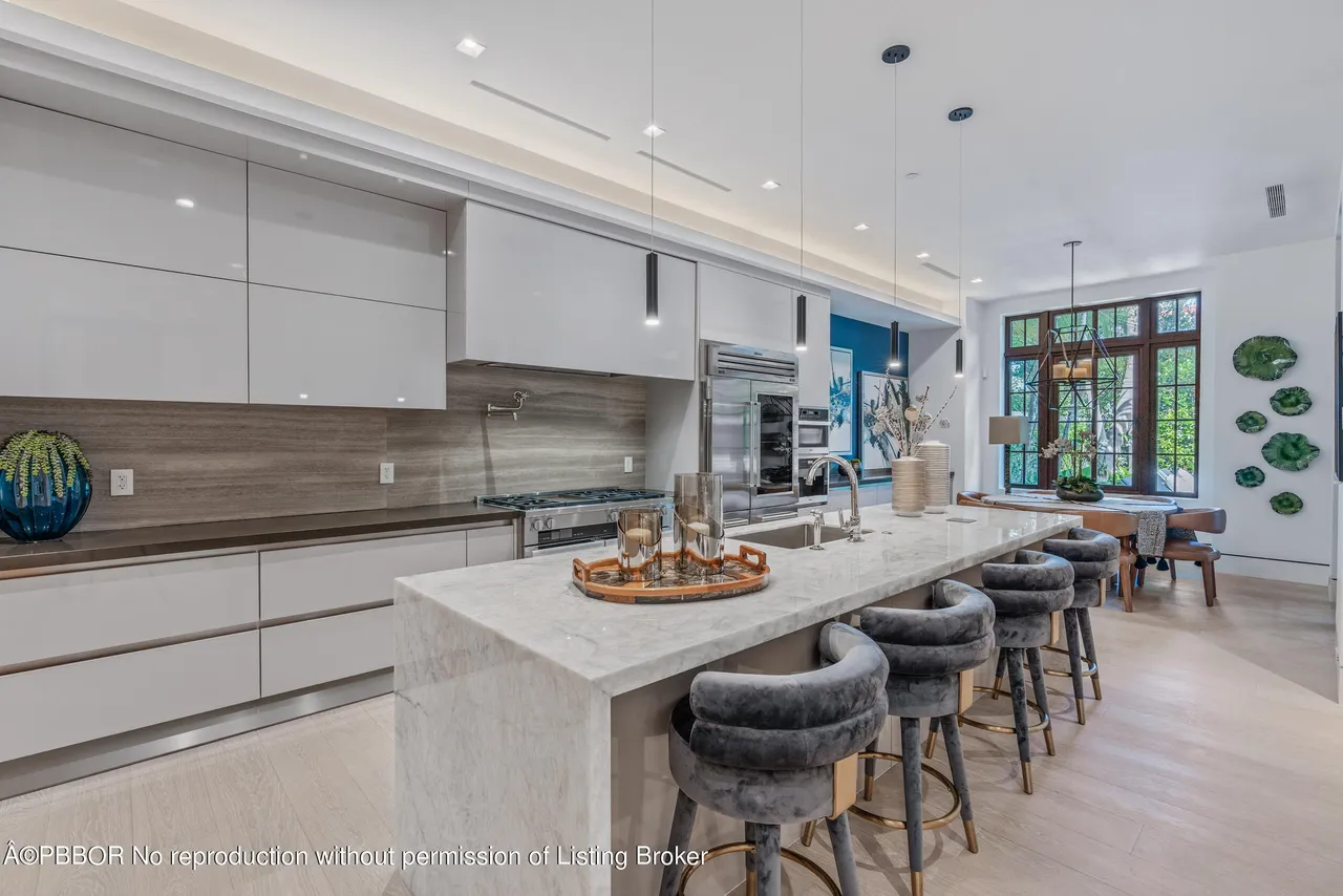 Stone surfaces in a light-filled kitchen